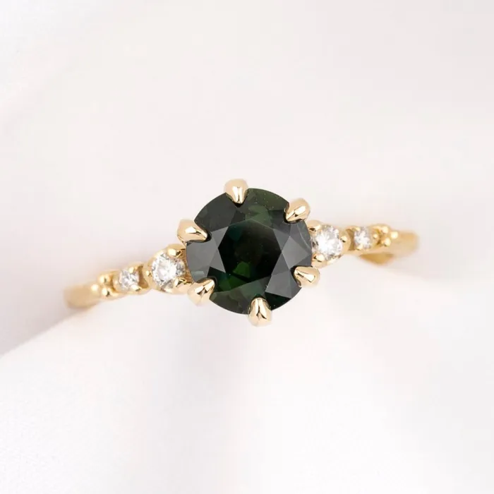 Envero Jewelry Rings Estel Fleur Six Prongs Ring 150ct Peacock Green Sapphire Sapphire 14k Yellow Gold One of a kind Envero Jewelry Rings Estel Fleur Six Prongs Ring 150ct Peacock Green Sapphire Sapphire 14k Yellow Gold One of a kind
