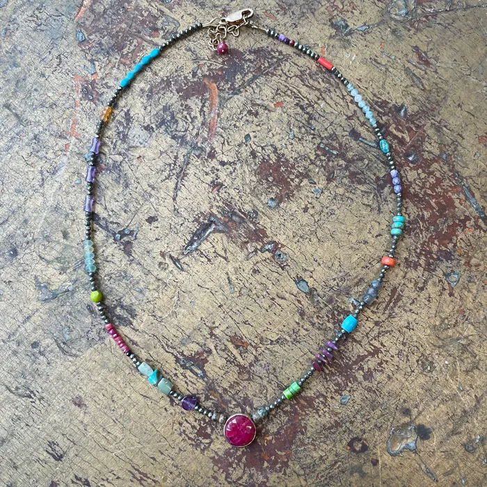 Necklaces Riverstone Tiny Hematite with Ruby Pendant Necklaces Riverstone Tiny Hematite with Ruby Pendant